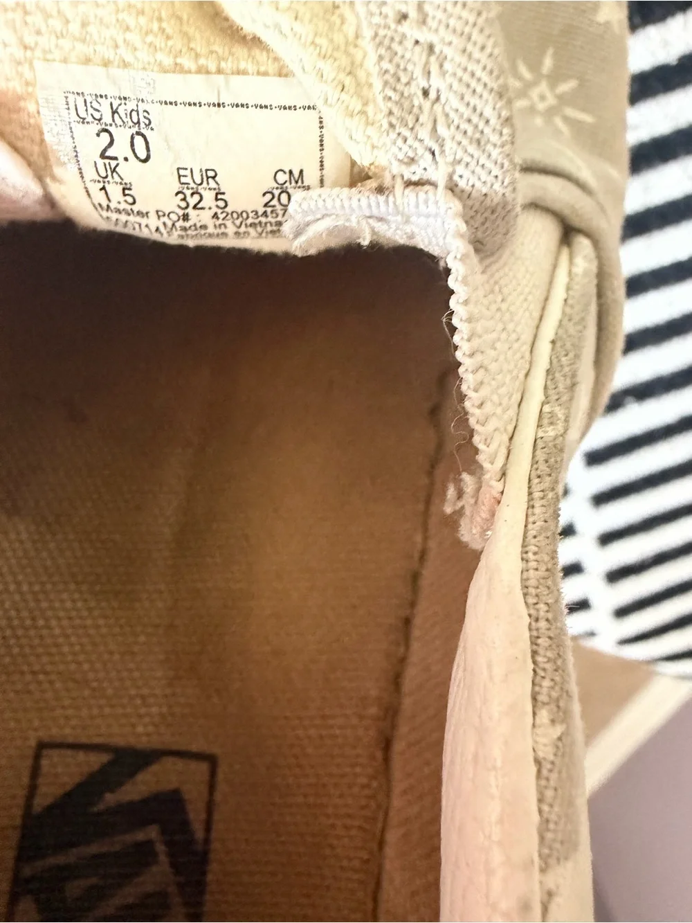 Vans Kids Slip-On Canvas Sneakers in Beige with White Space Print